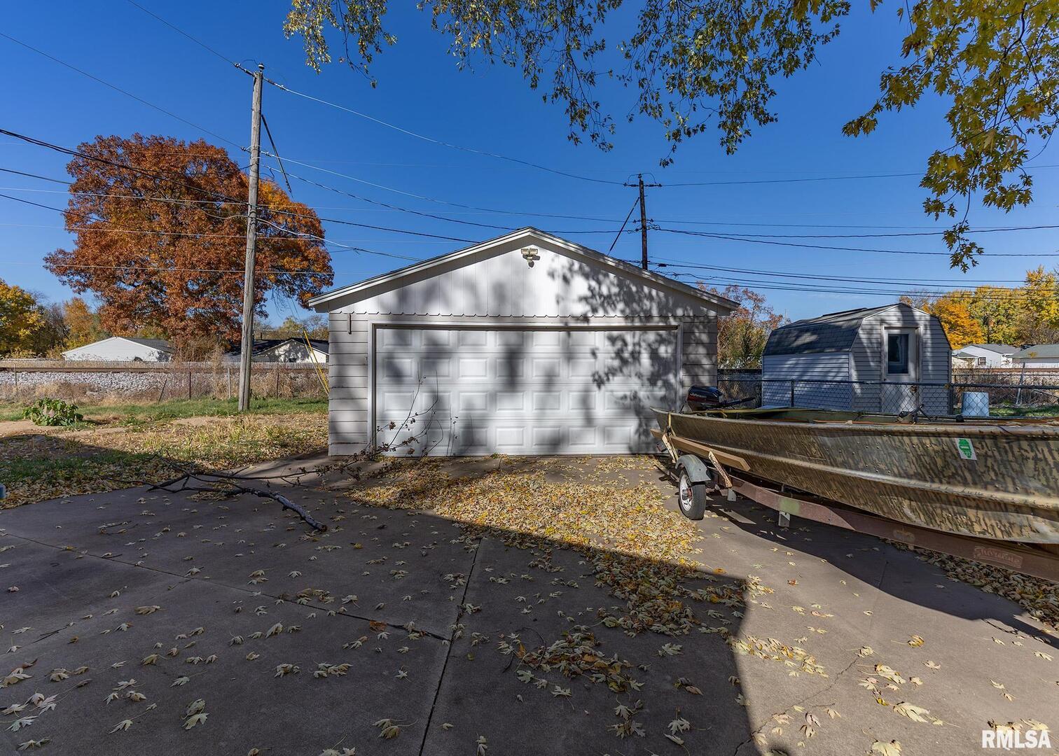 1430 4th Street Camanche, IA 52730 - Photo 21 of 22 a view of a backyard with pathway