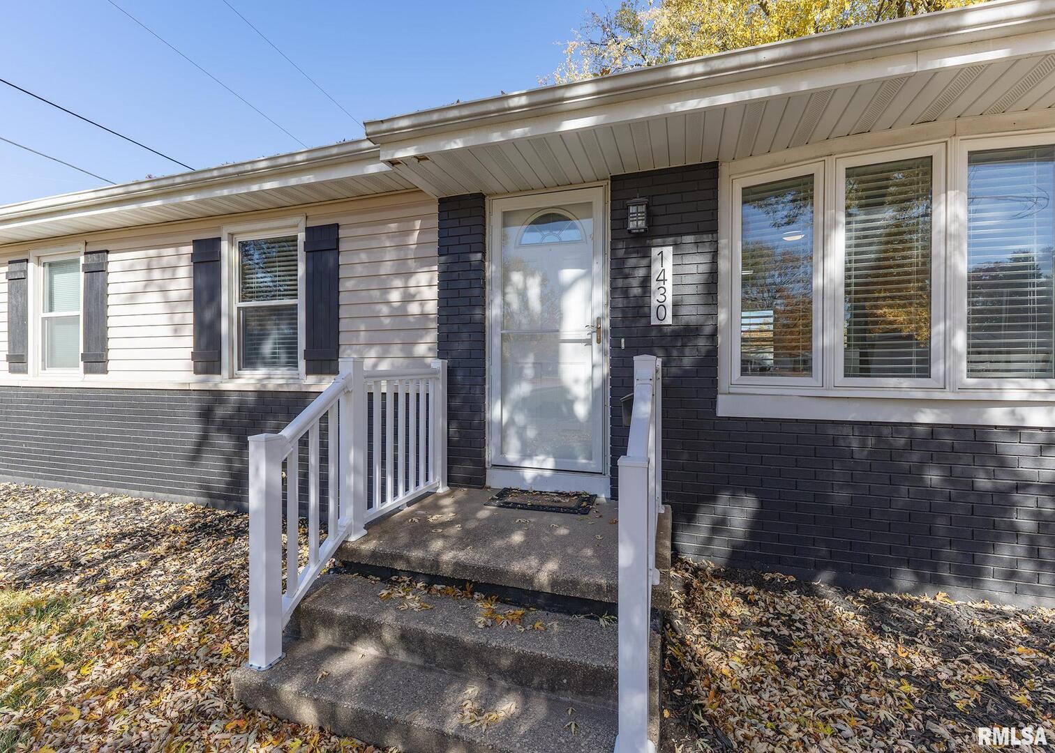 1430 4th Street Camanche, IA 52730 - Photo 4 of 22 a front view of a house