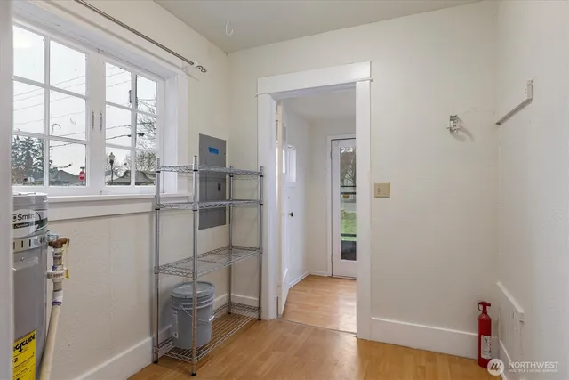 an aerial view of a house with a garden and swimming pool