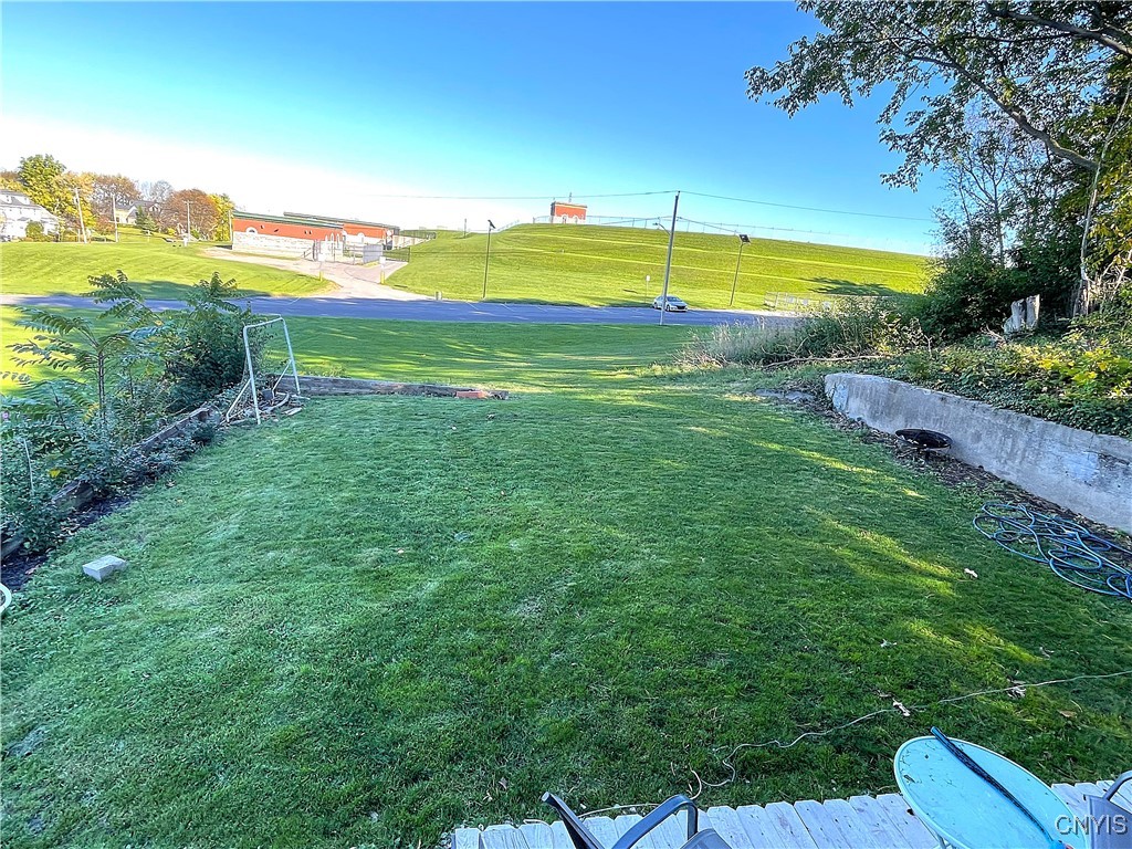 219 Rider Avenue, Unit 23 Syracuse, NY 13207 - Photo 42 of 47 back yard with Woodland Reservoir view