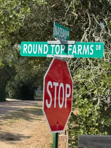 a sign broad on the side of the road