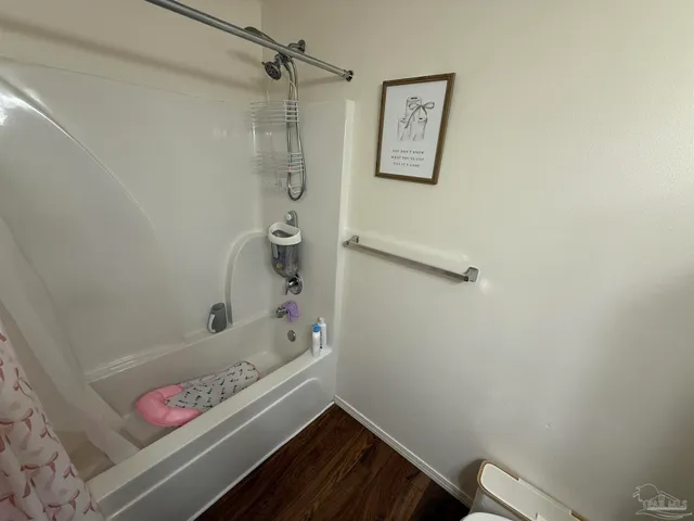 a bathroom with a bathtub