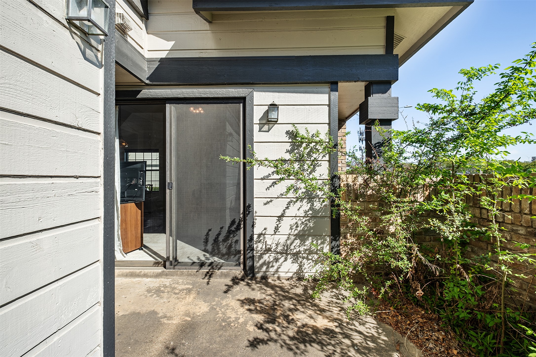 1748 Ohlen Road, Unit 16 Austin, TX 78757 - Photo 32 of 38 a view of a door of the house