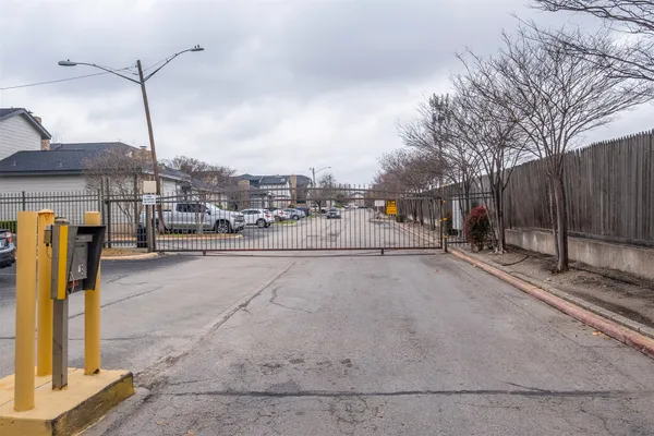 a view of a city street with a building