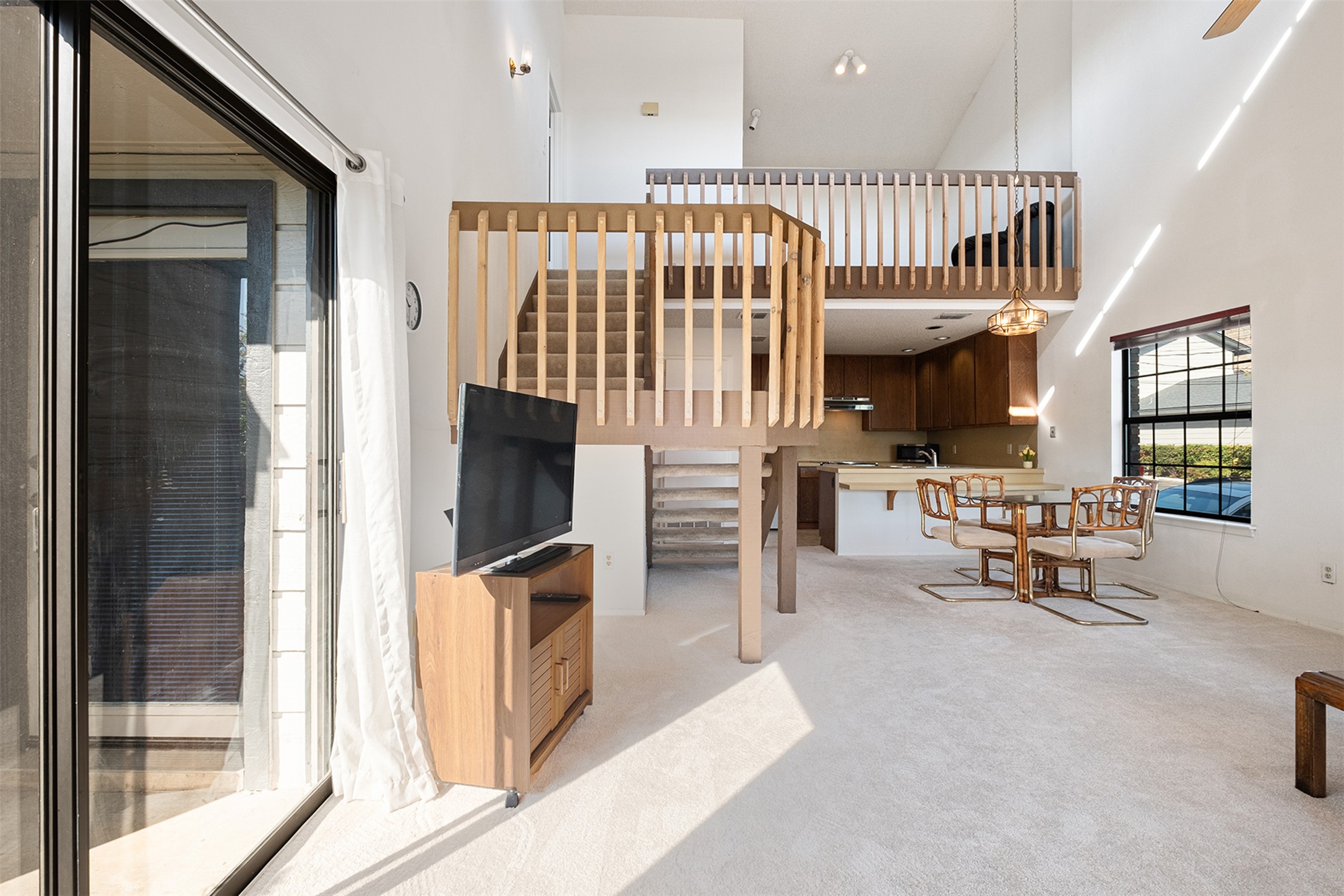 1748 Ohlen Road, Unit 16 Austin, TX 78757 - Photo 6 of 38 a living room with furniture and a flat screen tv