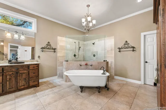 a bathroom with a sink double vanity and a mirror