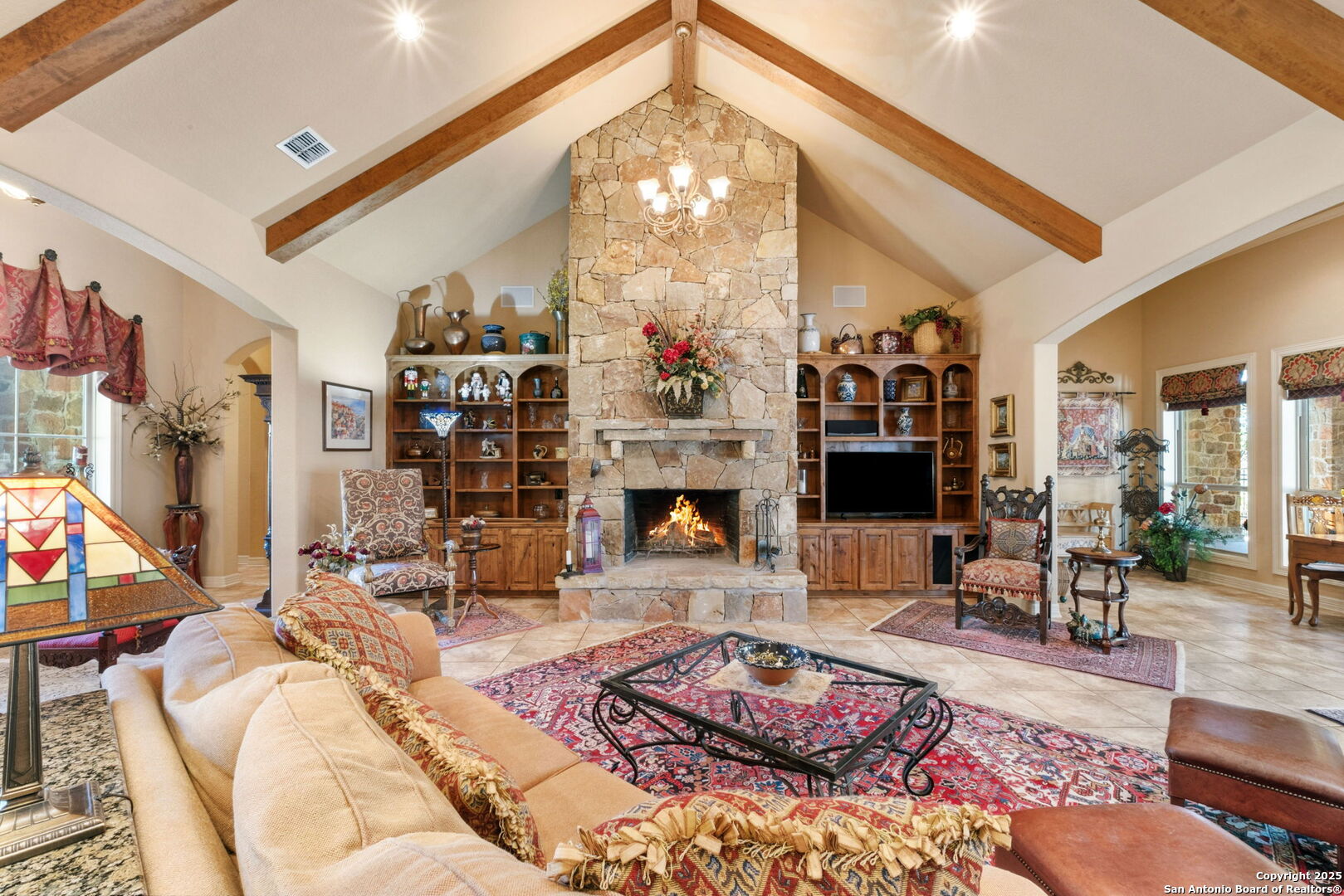 325 Whitestone Drive Spring Branch, TX 78070 - Photo 20 of 50 a living room with furniture large window and a fireplace