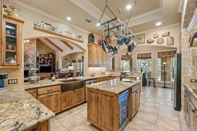 a kitchen with a counter space cabinets and stainless steel appliances
