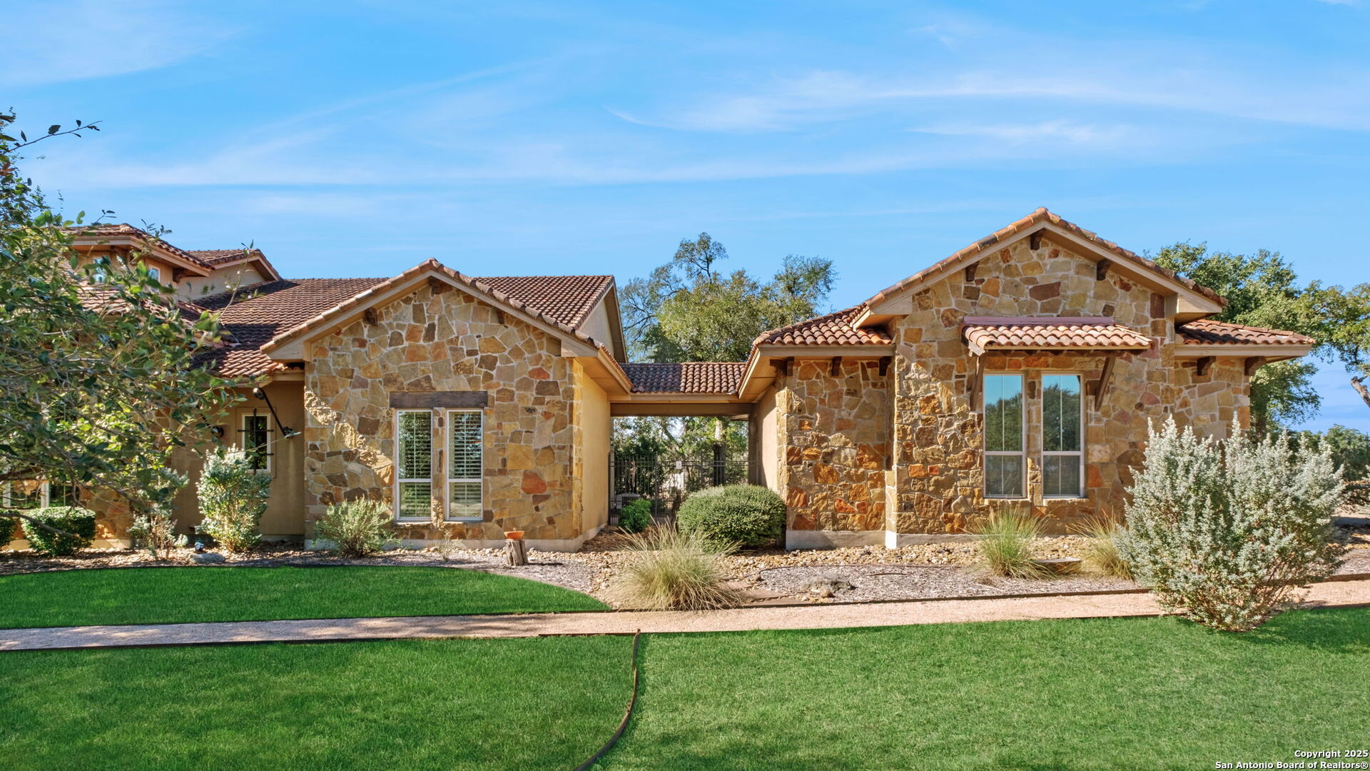 325 Whitestone Drive Spring Branch, TX 78070 - Photo 4 of 50 a front view of house with a garden