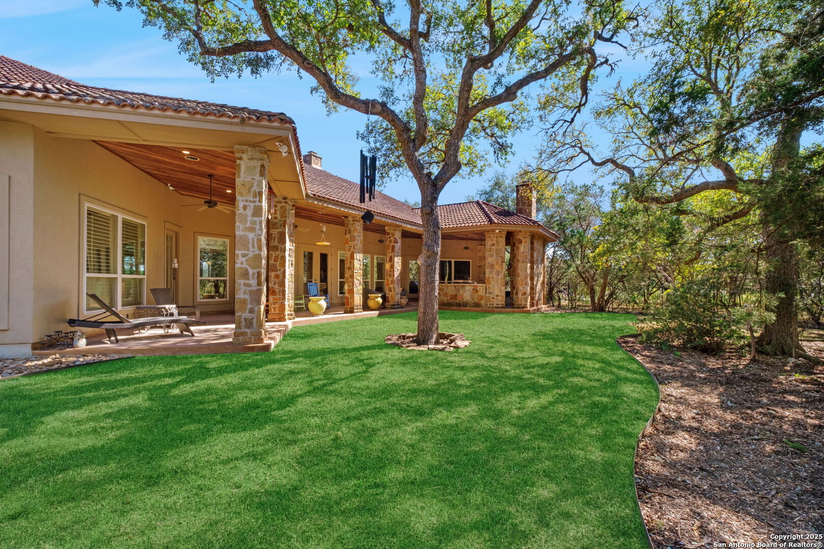 325 Whitestone Drive Spring Branch, TX 78070 - Photo 42 of 50 a view of a house with a yard porch and sitting area