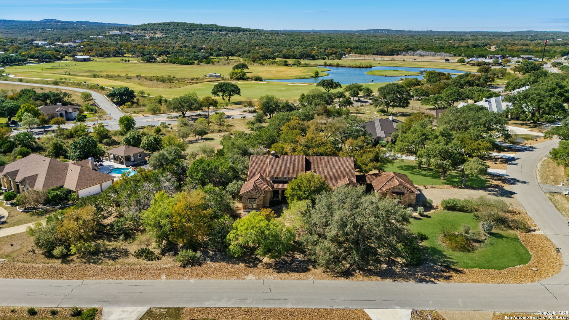 325 Whitestone Drive Spring Branch, TX 78070 - Photo 50 of 50 an aerial view of residential houses with outdoor space and trees
