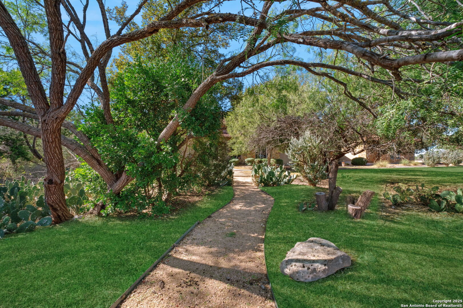325 Whitestone Drive Spring Branch, TX 78070 - Photo 5 of 50 a view of a table and chairs in the garden