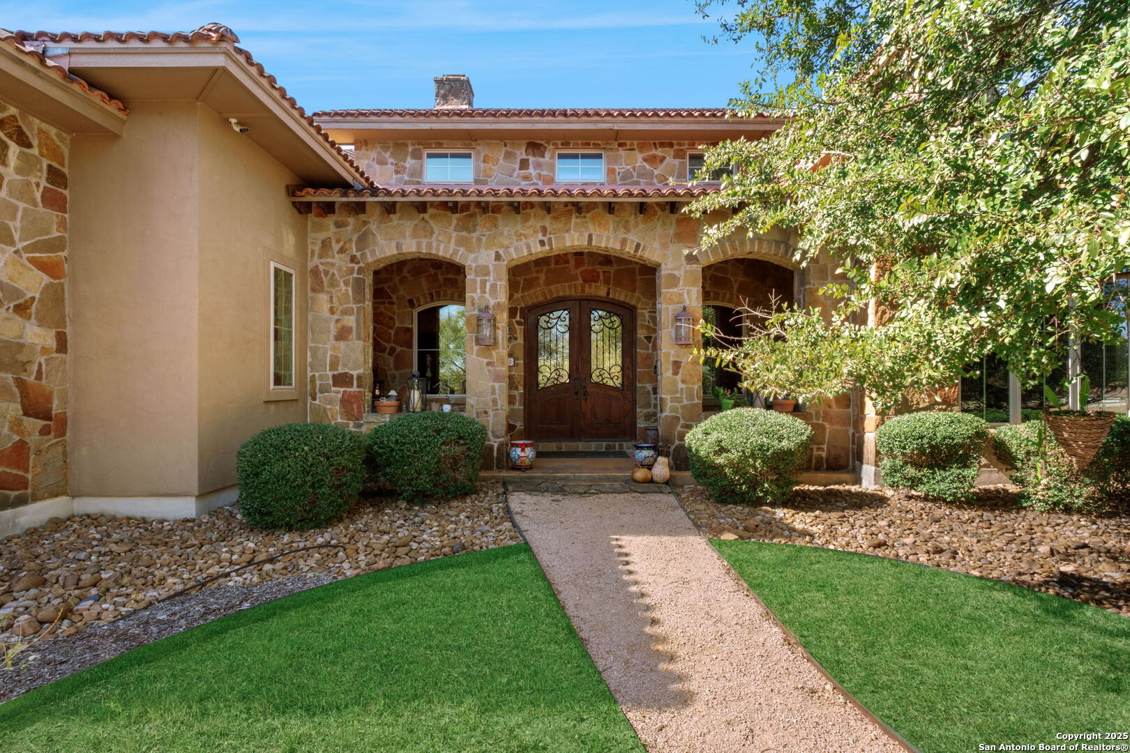 325 Whitestone Drive Spring Branch, TX 78070 - Photo 6 of 50 a front view of a house with a garden