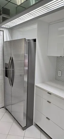 a close view of a shower in kitchen