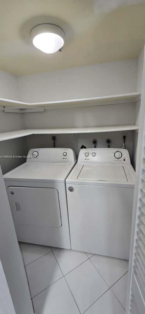 2843 South Bayshore Drive, Unit 3A Miami, FL 33133 - Photo 13 of 43 a utility room with washer and dryer