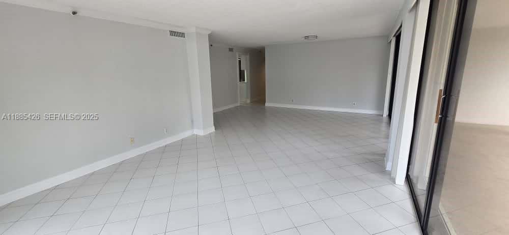 2843 South Bayshore Drive, Unit 3A Miami, FL 33133 - Photo 18 of 43 a view of hallway with white walls