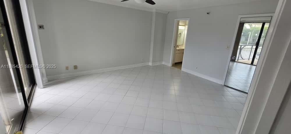 2843 South Bayshore Drive, Unit 3A Miami, FL 33133 - Photo 27 of 43 an empty room with windows