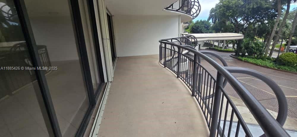 2843 South Bayshore Drive, Unit 3A Miami, FL 33133 - Photo 37 of 43 a view of a hallway with wooden floor and stairs