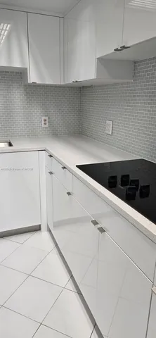 a view of a refrigerator and window