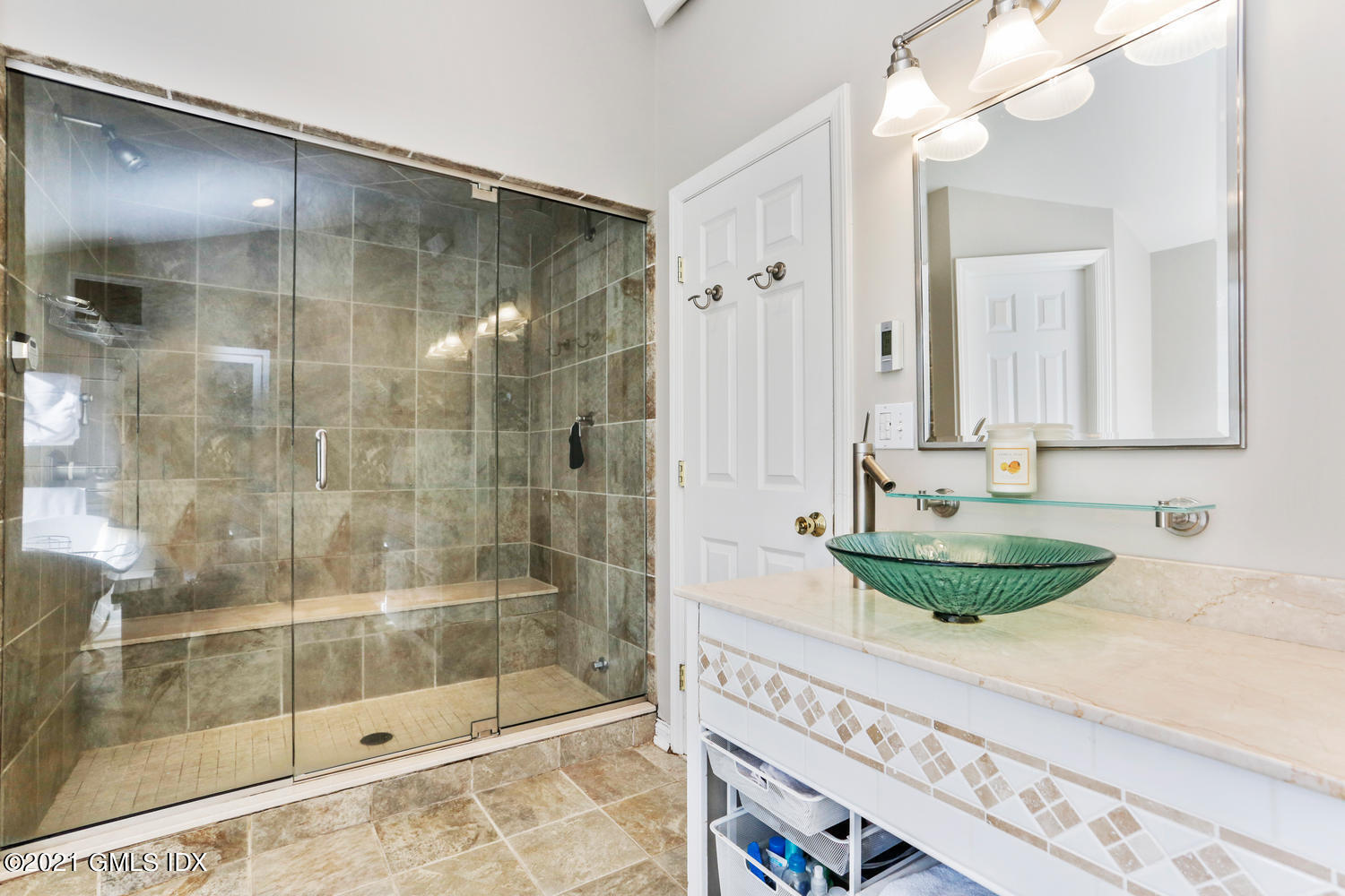 6 Palmer Terrace Riverside, CT 06878 - Photo 12 of 24 a bathroom with a granite countertop sink a mirror and shower