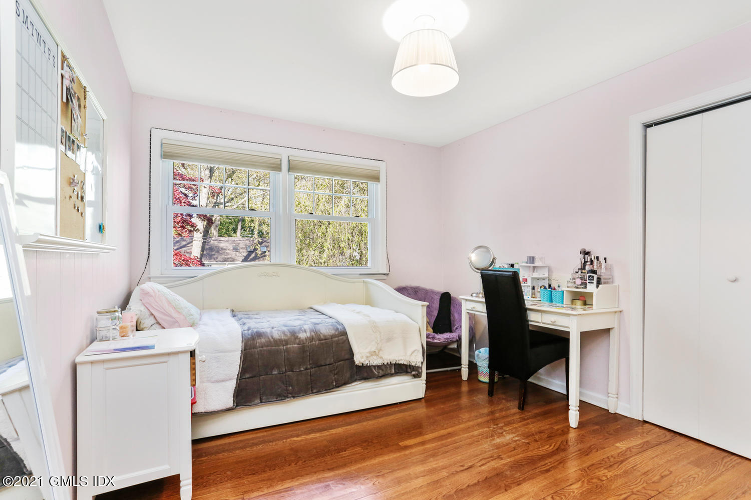 6 Palmer Terrace Riverside, CT 06878 - Photo 16 of 24 a bedroom with a bed and a table in it