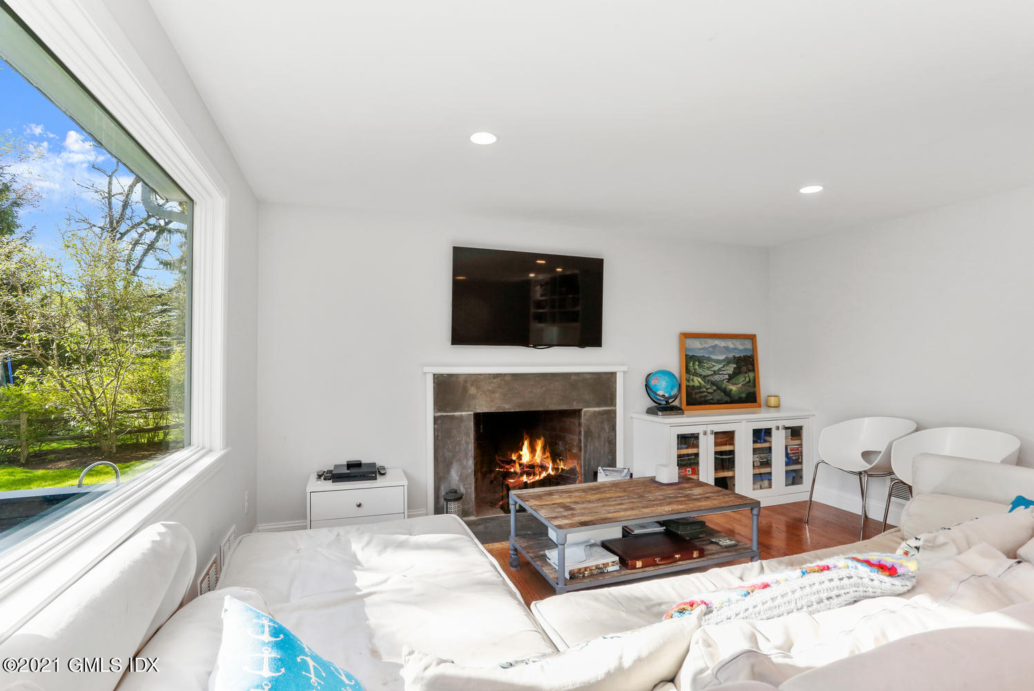 6 Palmer Terrace Riverside, CT 06878 - Photo 4 of 24 a living room with furniture fireplace and window