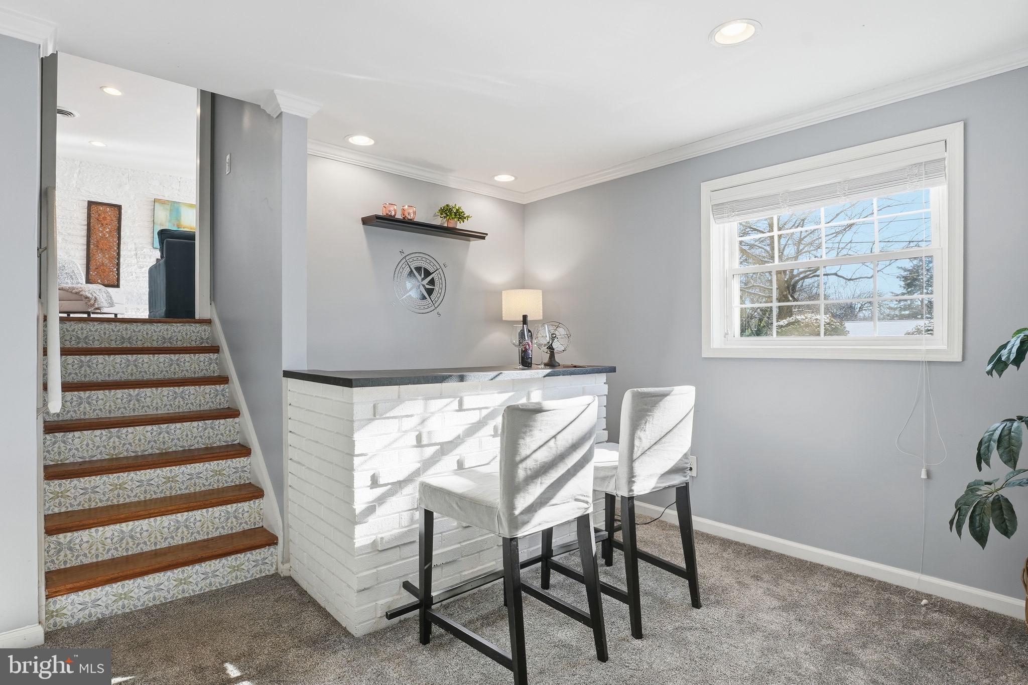 19 Williams Drive Annapolis, MD 21401 - Photo 14 of 45 a view of a livingroom with furniture and staircase