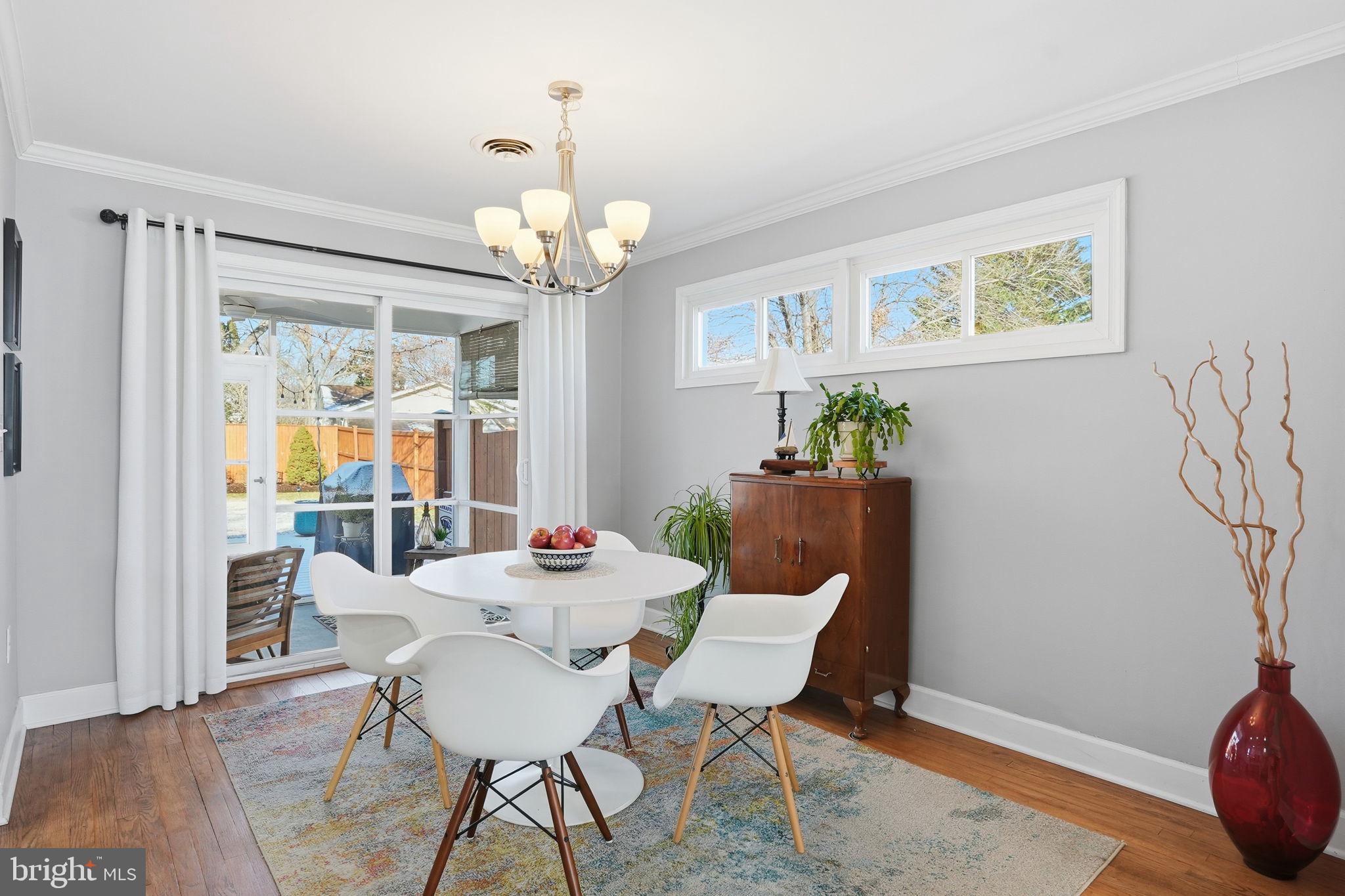 19 Williams Drive Annapolis, MD 21401 - Photo 18 of 45 a view of a dining room with furniture and wooden floor