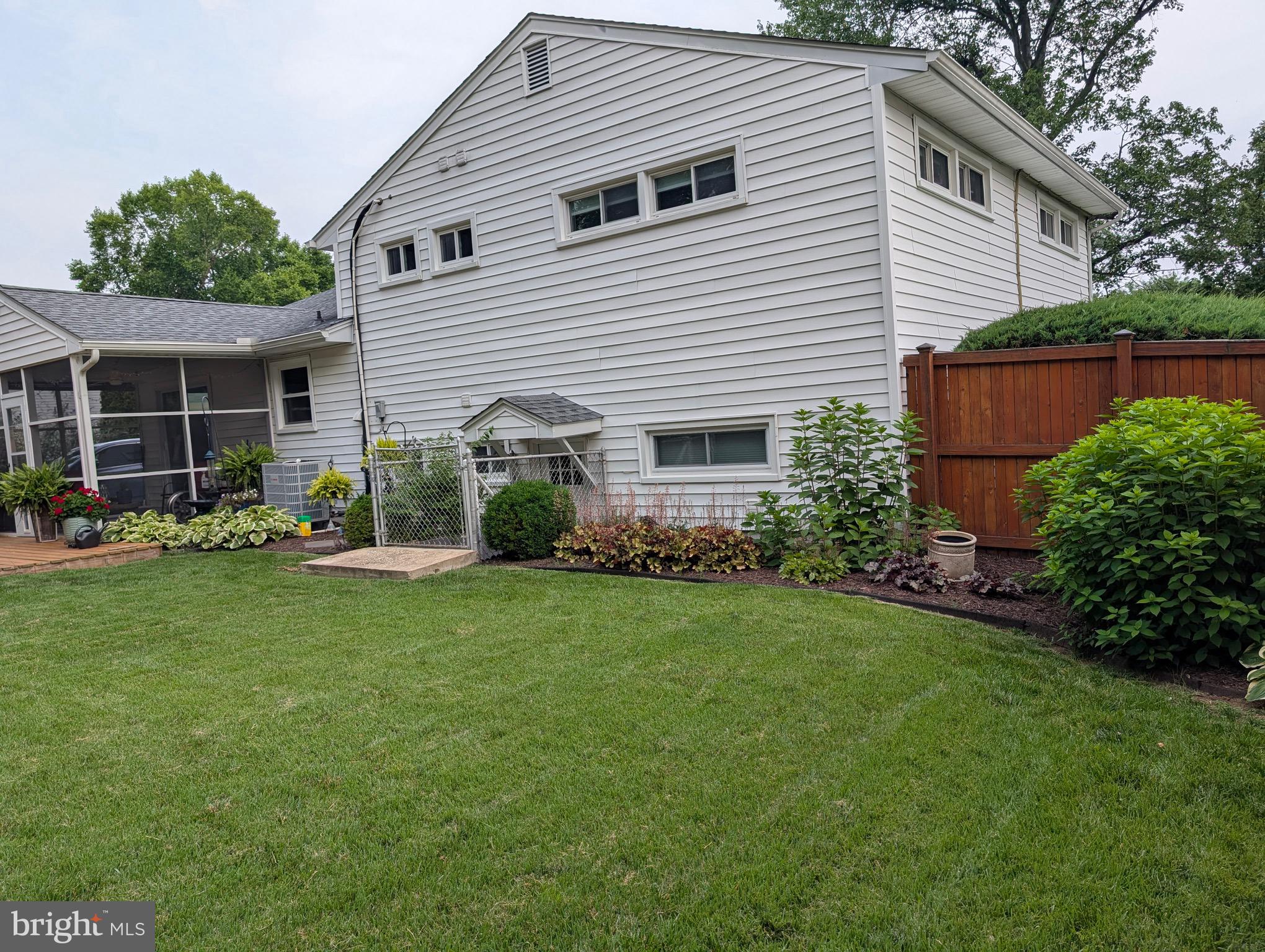 19 Williams Drive Annapolis, MD 21401 - Photo 35 of 45 a front view of house with yard and outdoor seating