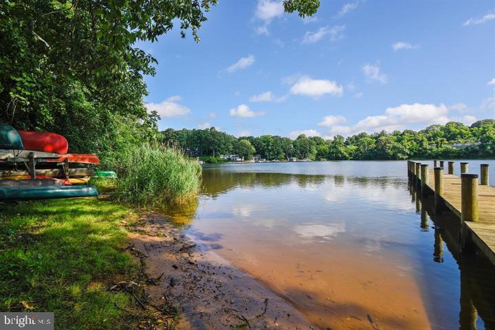 19 Williams Drive Annapolis, MD 21401 - Photo 43 of 45 a view of a lake with a house in the background