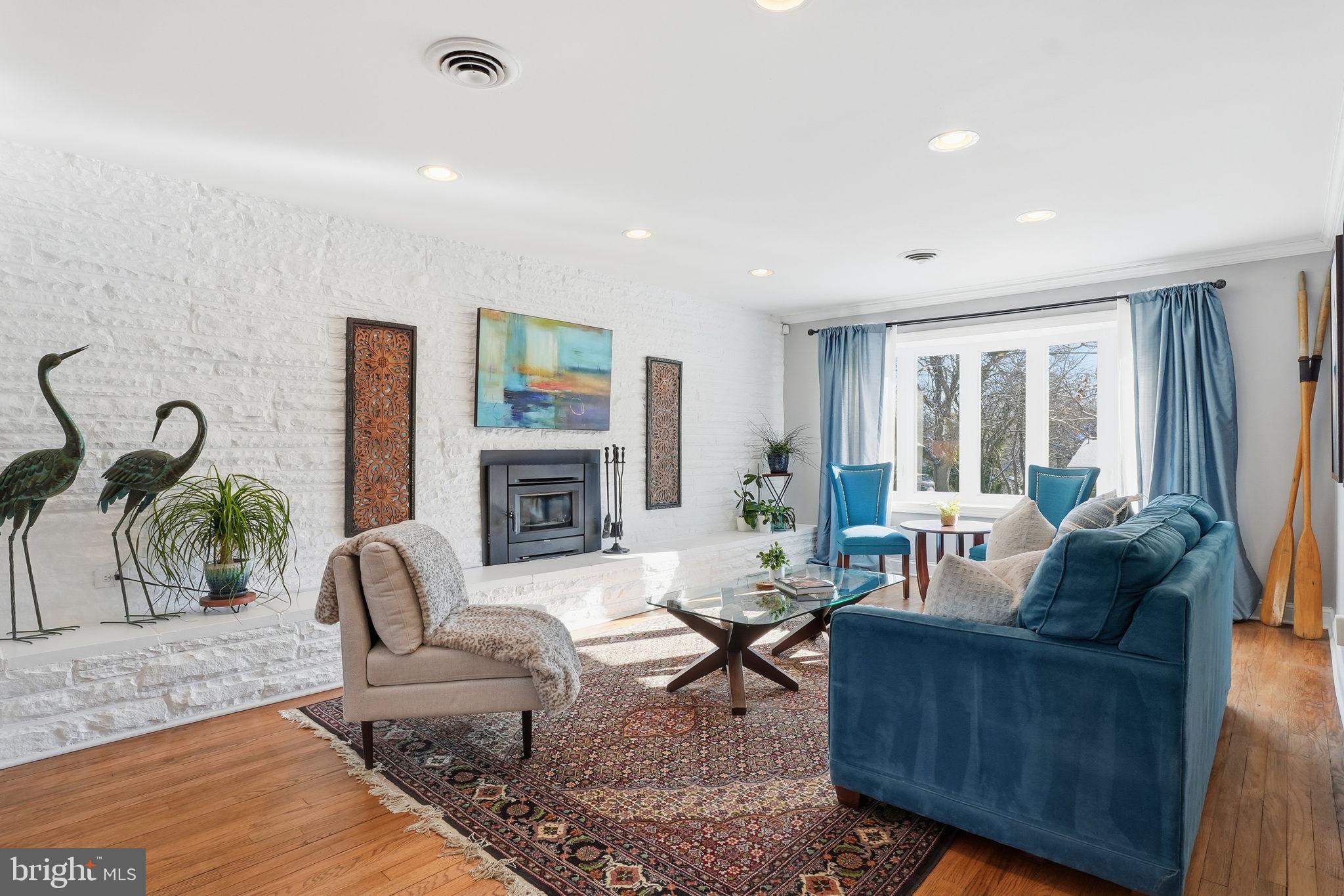 19 Williams Drive Annapolis, MD 21401 - Photo 5 of 45 a living room with fireplace furniture and a large window