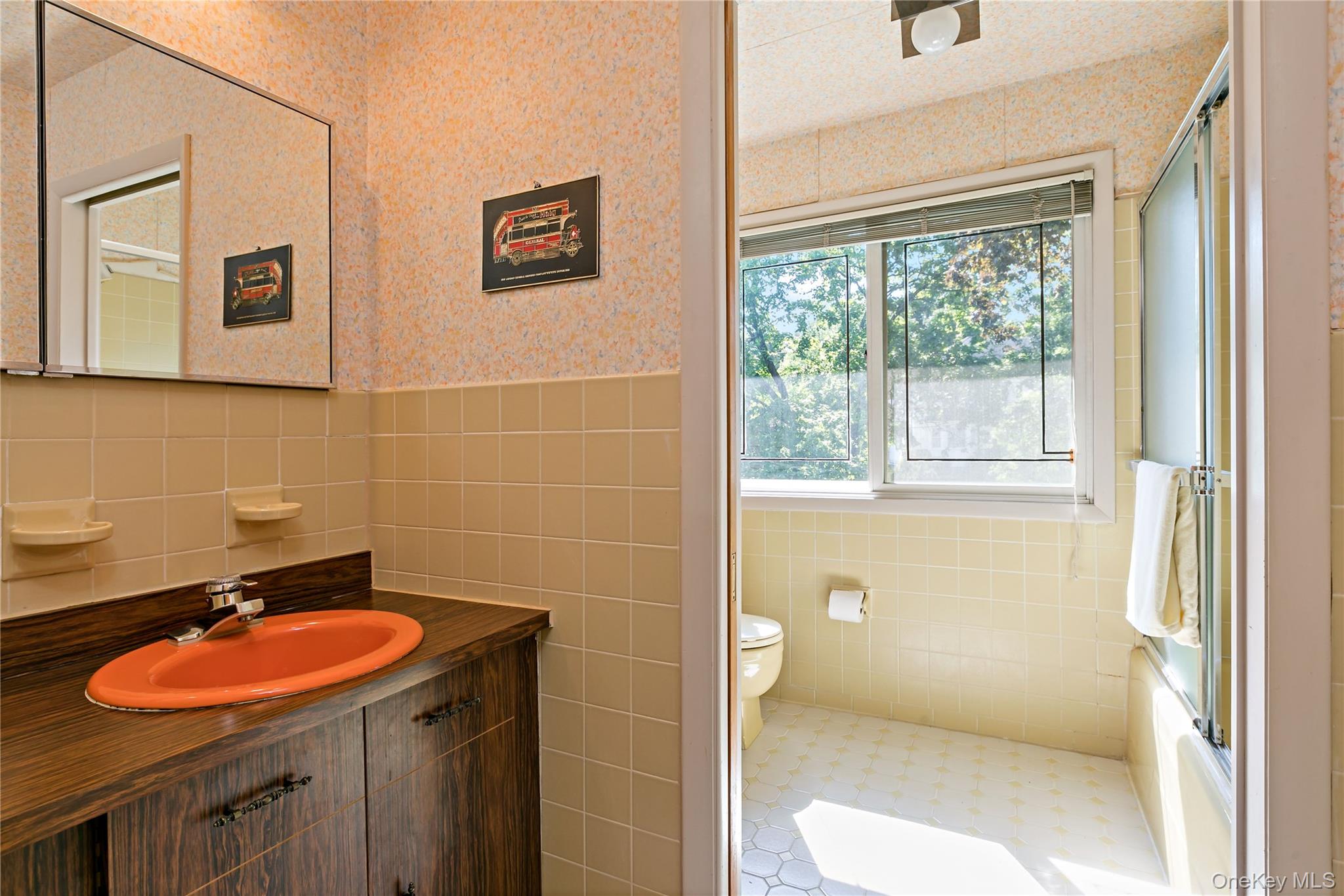16 Meadow Road Scarsdale, NY 10583 - Photo 26 of 47 a bathroom with a sink toilet and shower