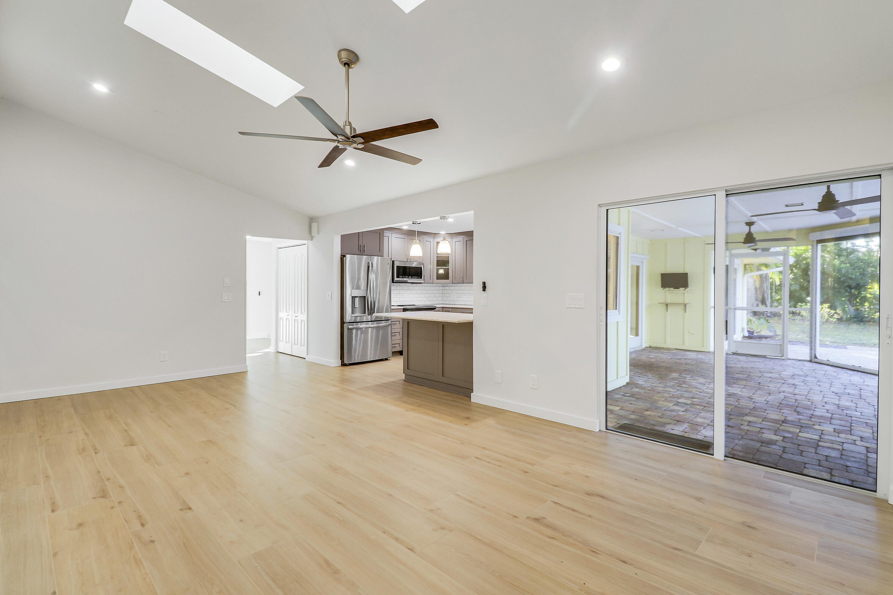 5775 Set-N-Sun Place Jupiter, FL 33458 - Photo 15 of 54 a view of a kitchen with a sink and a window
