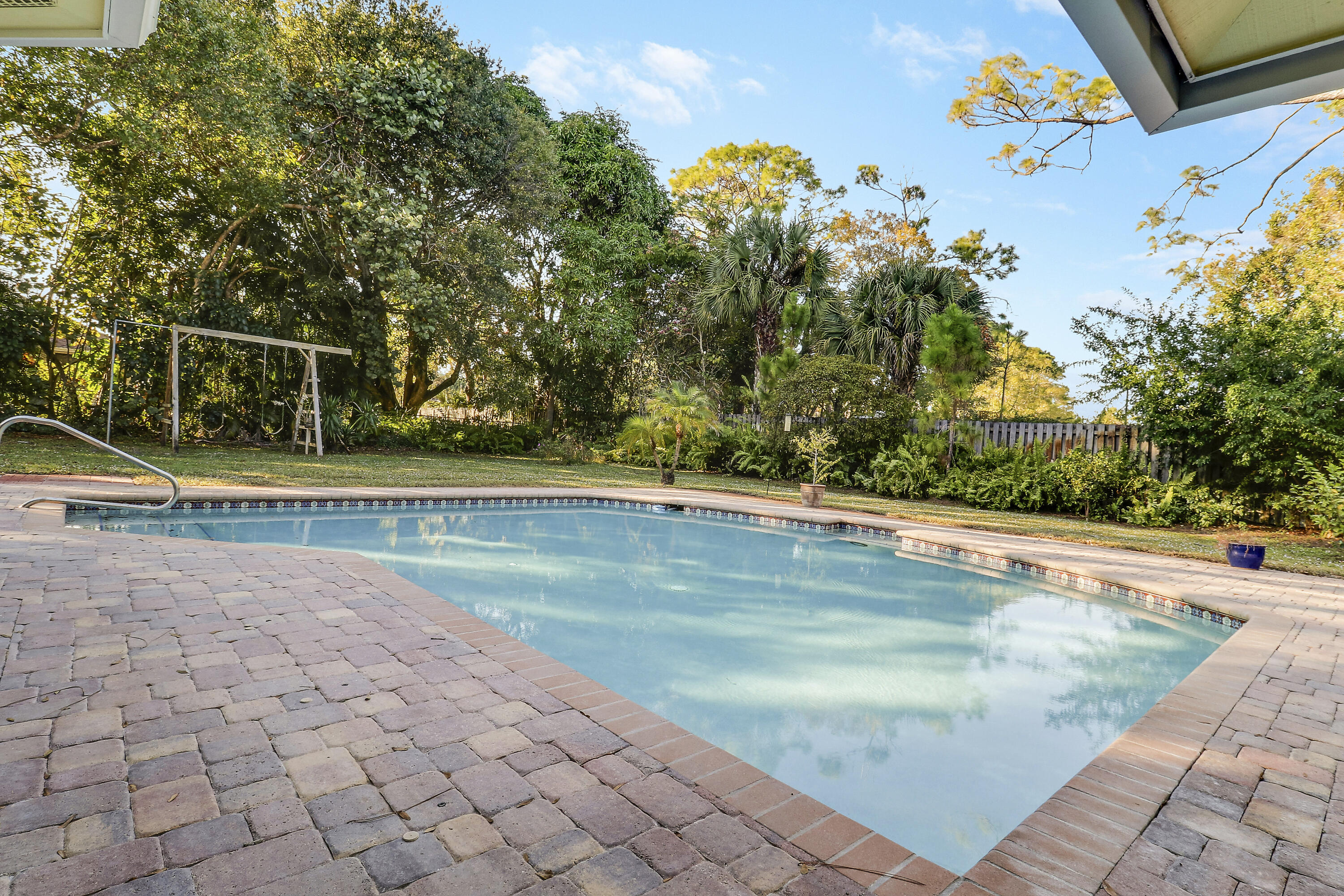 5775 Set-N-Sun Place Jupiter, FL 33458 - Photo 45 of 54 a view of a backyard