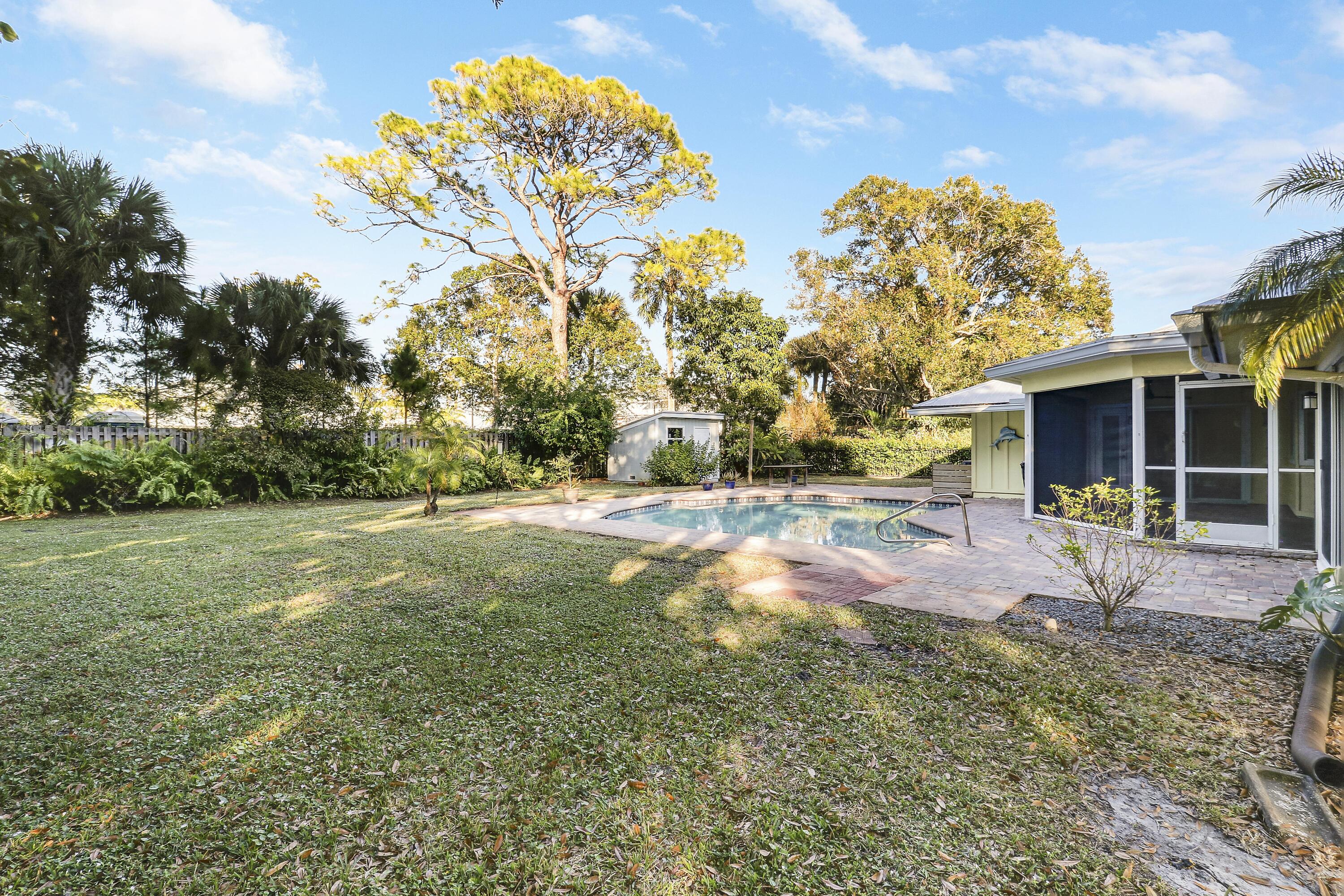 5775 Set-N-Sun Place Jupiter, FL 33458 - Photo 50 of 54 a view of backyard with green space