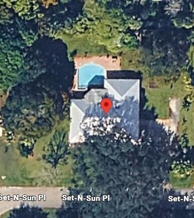 5775 Set-N-Sun Place Jupiter, FL 33458 - Photo 51 of 54 a view of a tree in a yard