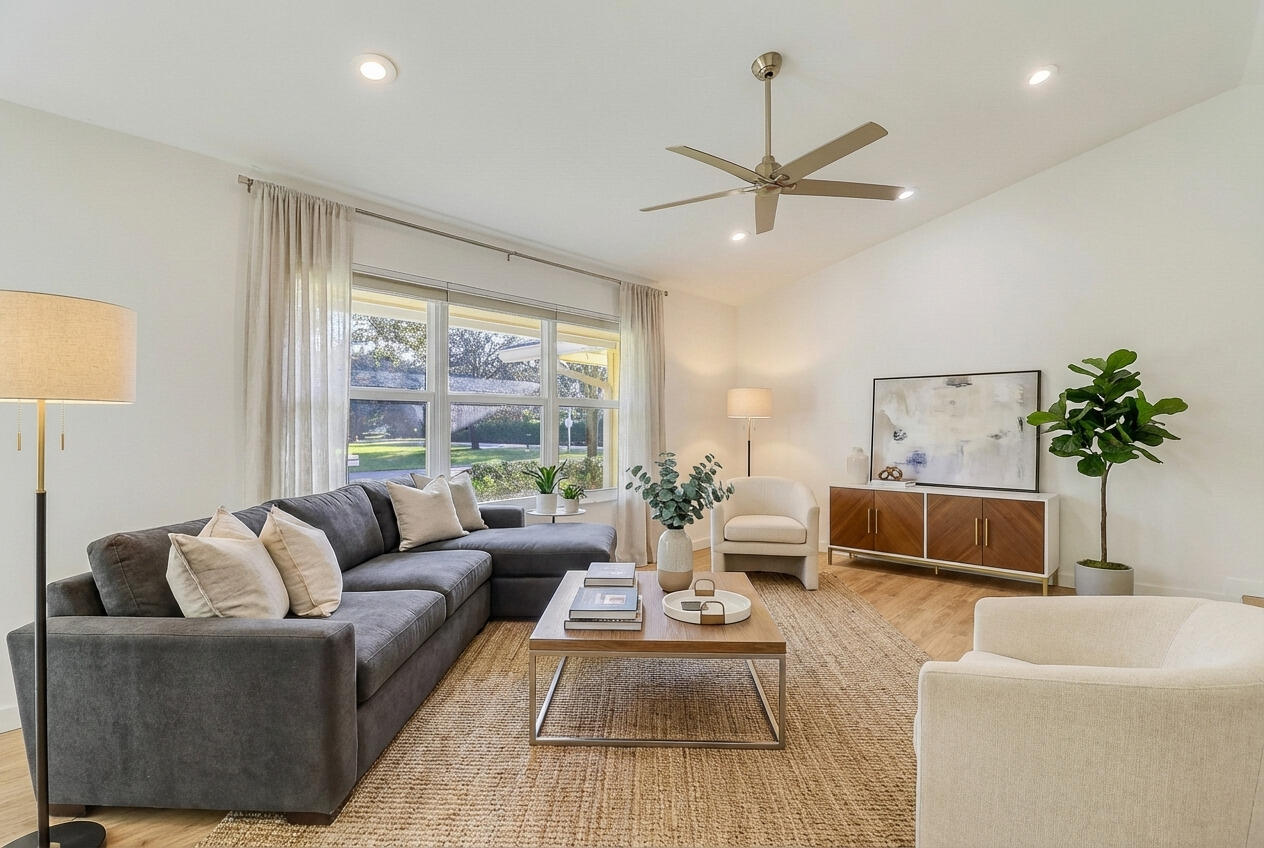 5775 Set-N-Sun Place Jupiter, FL 33458 - Photo 52 of 54 a living room with furniture and a large window