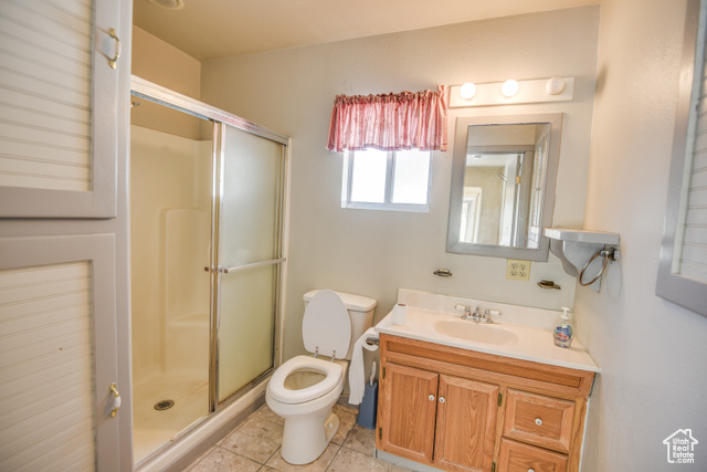 2373 East 190 North Beaver, UT 84713 - Photo 31 of 54 Full bath featuring a shower stall, vanity, and light tile patterned floors