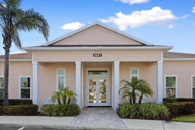 front view of a house with a small yard