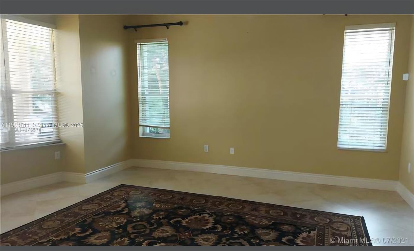 4045 Southwest 151st Terrace Miramar, FL 33027 - Photo 15 of 29 a room with a bed and a window