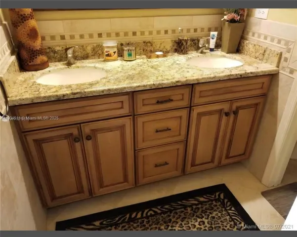 a bathroom with a sink and bathtub