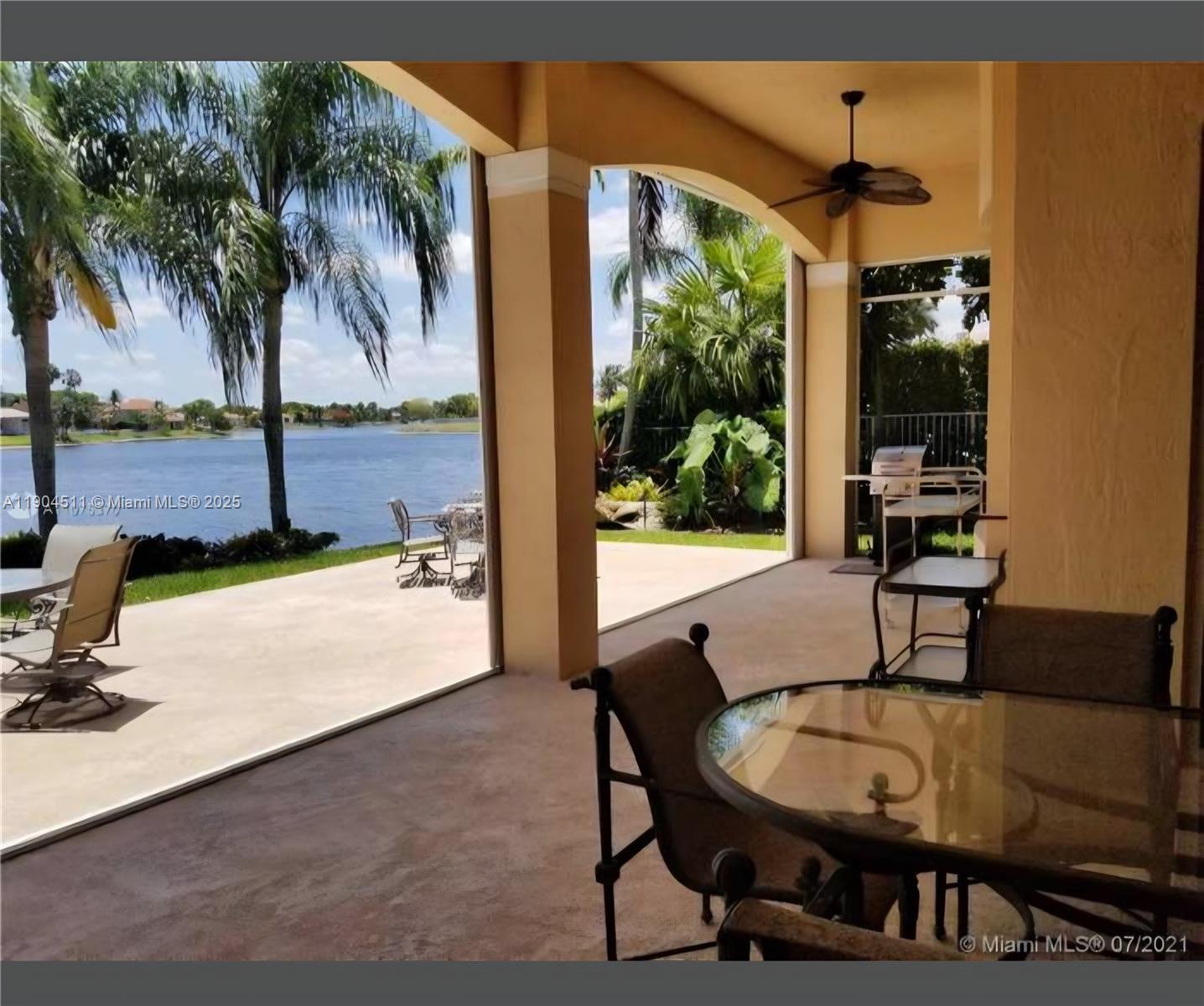 4045 Southwest 151st Terrace Miramar, FL 33027 - Photo 24 of 29 a view of a dining room with a table and chairs