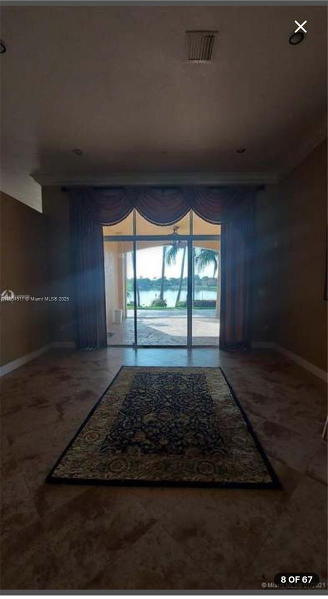 4045 Southwest 151st Terrace Miramar, FL 33027 - Photo 6 of 29 a view of a room with an empty space and window