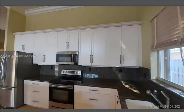 a view of a car parked in the room