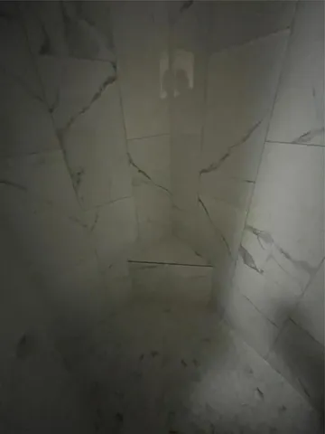 close up of a shower in a bathroom