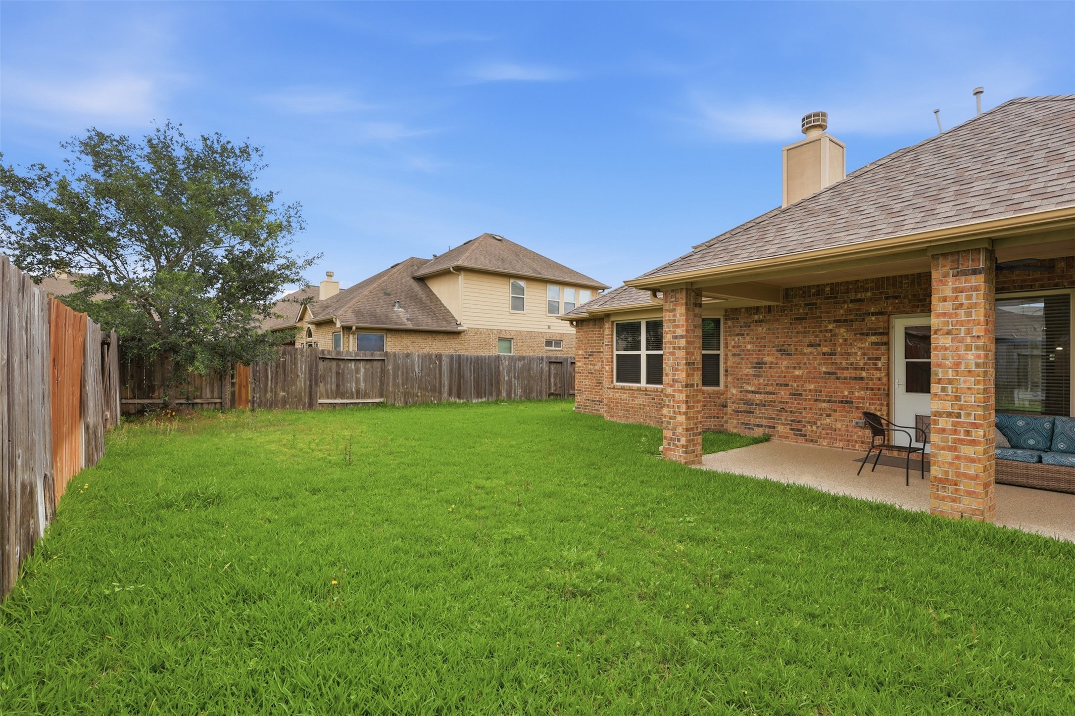 22943 Dale River Road Tomball, TX 77375 - Photo 28 of 29 a view of a house with a yard