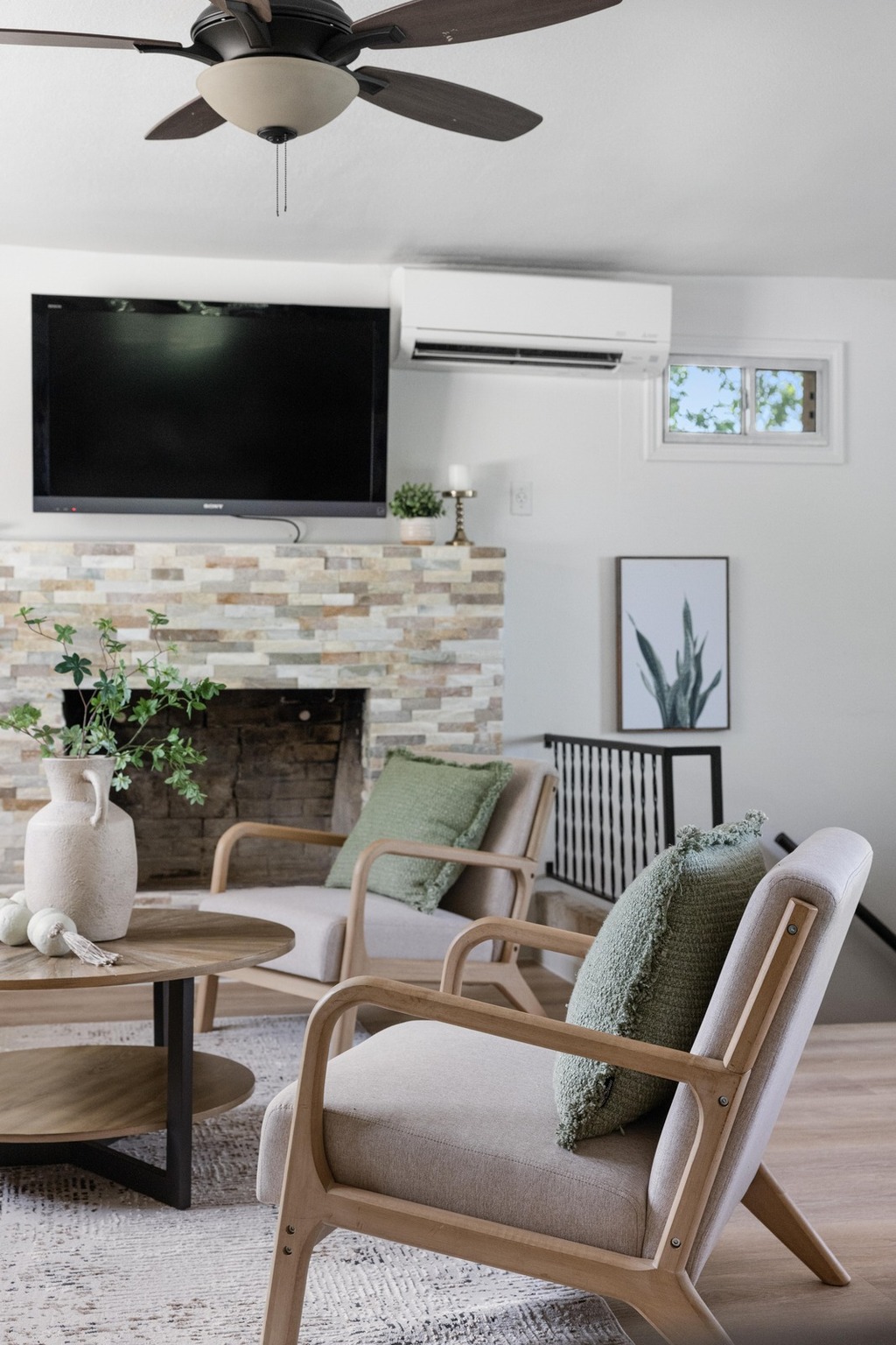 13566 Bullick Hollow Road Austin, TX 78726 - Photo 11 of 32 a living room with furniture and a flat screen tv