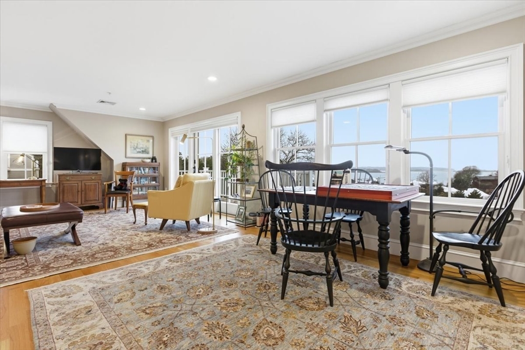 1090 Shore Road, Unit 7 Bourne, MA 02559 - Photo 23 of 42 a view of a dining room with furniture