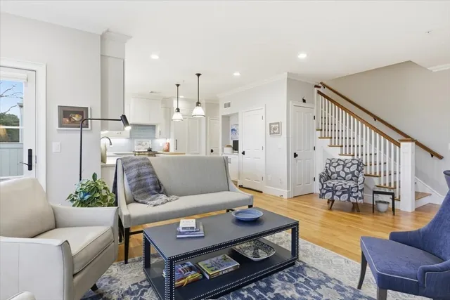 a living room with furniture and a rug