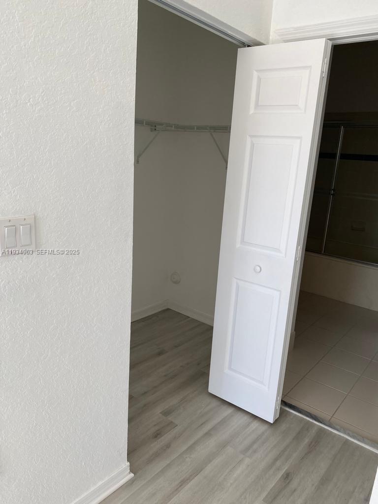 11024 Southwest 237th Lane Homestead, FL 33032 - Photo 13 of 16 a view of front door with wooden floor